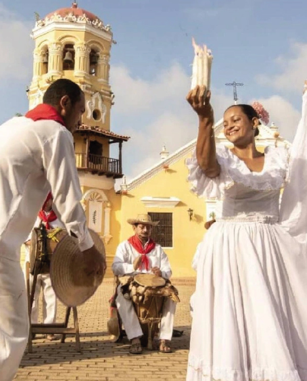 Musical group playing and dancing a Colombian genre