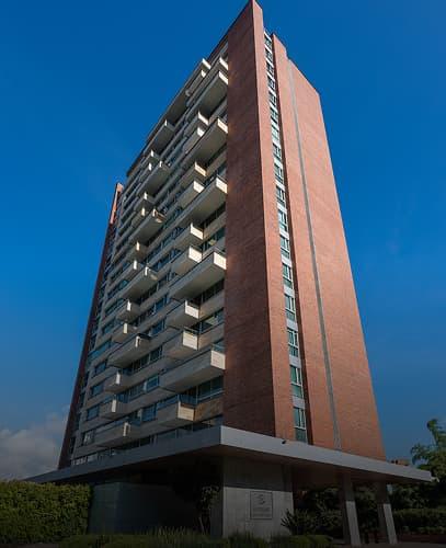 High-rise building of Hotel Arizona Suites with clear skies