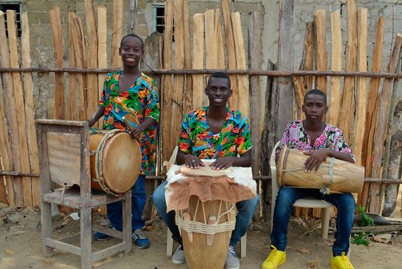 Men with drums in a neighborhood of San Basilio de Palenque
