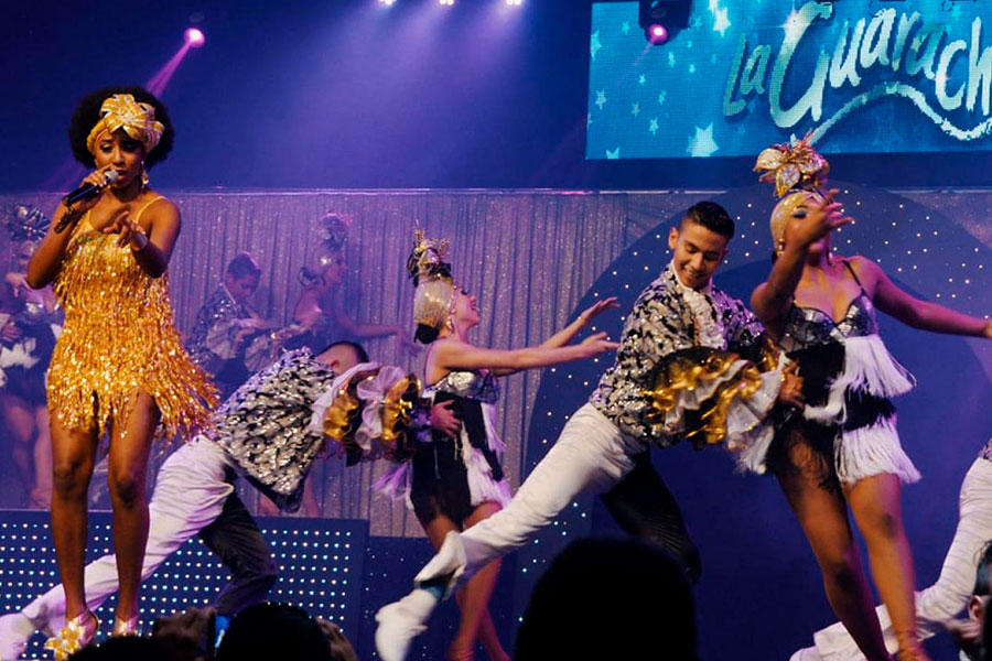 Salsa dancers performing on stage
