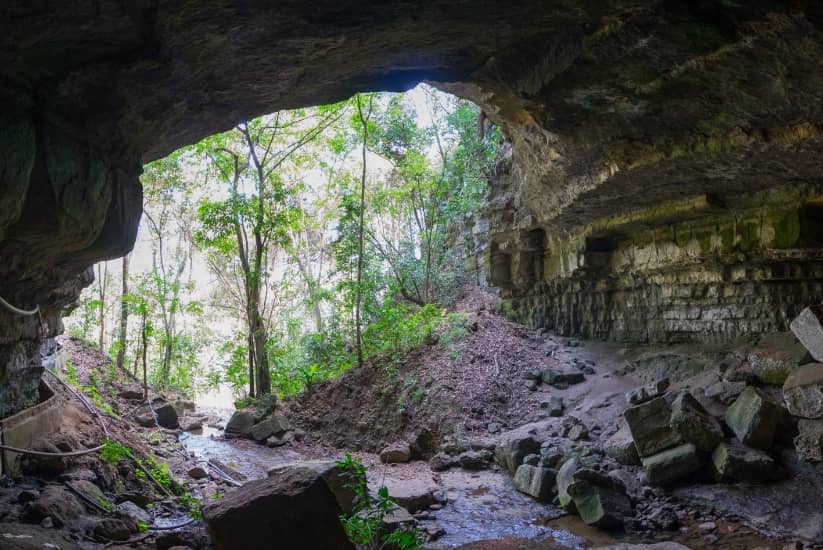 The great Indio cave near San Gil, rocks, mud, and trees adorn this place