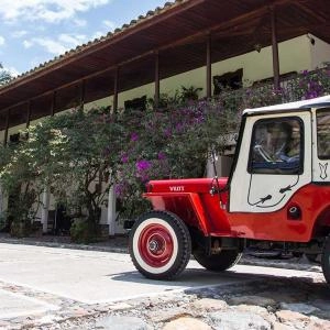 Jeep and typical house of the Coffee Cultural Landscape