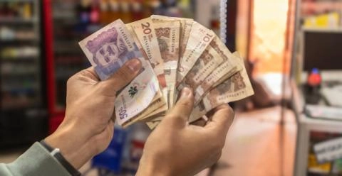 Colombian peso banknotes in different denominations and colors
